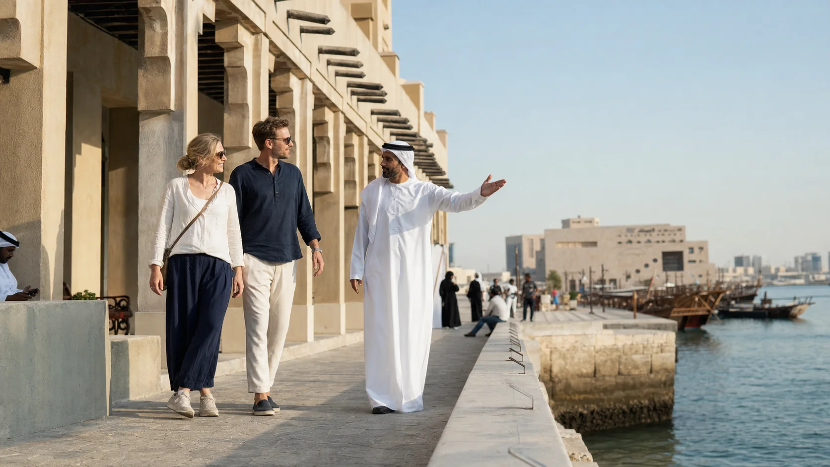 Nordic travellers exploring a Gulf waterfront with a local guide